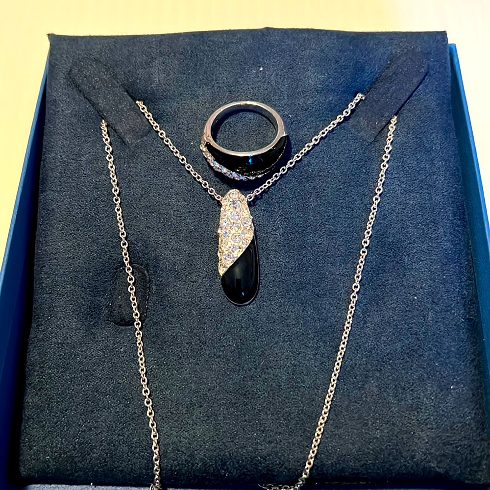 Silver and black rhinestone necklace and ring.